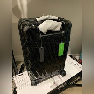 TUMI 19 Degree Polycarbonate International Expandable 4 Wheel Carry On Luggage